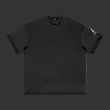 Black t-shirt with a logo on the sleeve against a white background